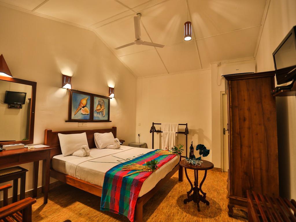 Thejan Beach Cabanas Bentota Habitación foto